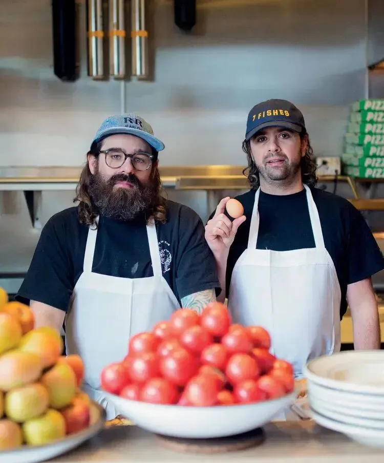 The chefs of Jon & Vinny's at the pass.