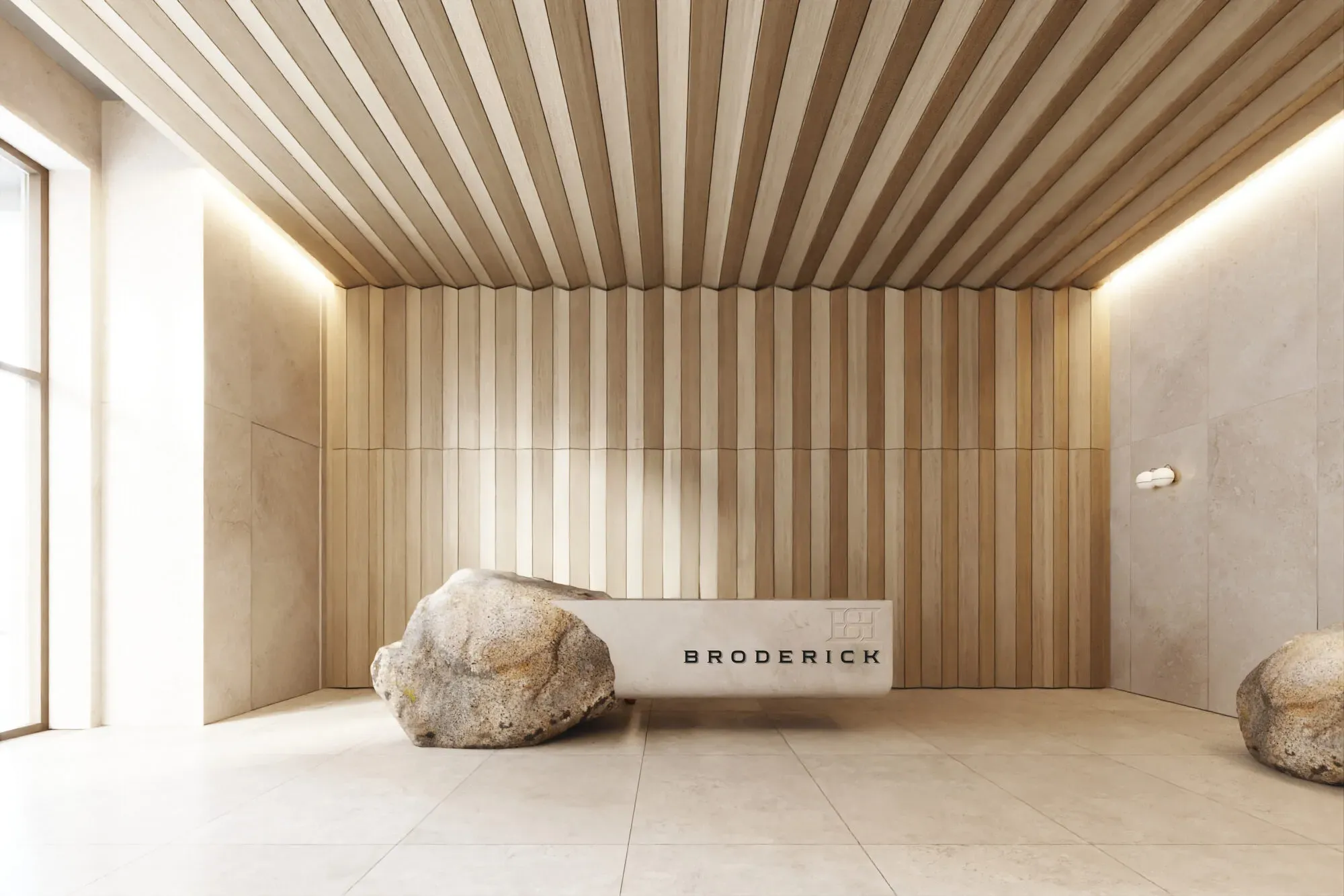Modern minimalist lobby entrance with wooden slat ceiling, reception desk, and decorative boulders
