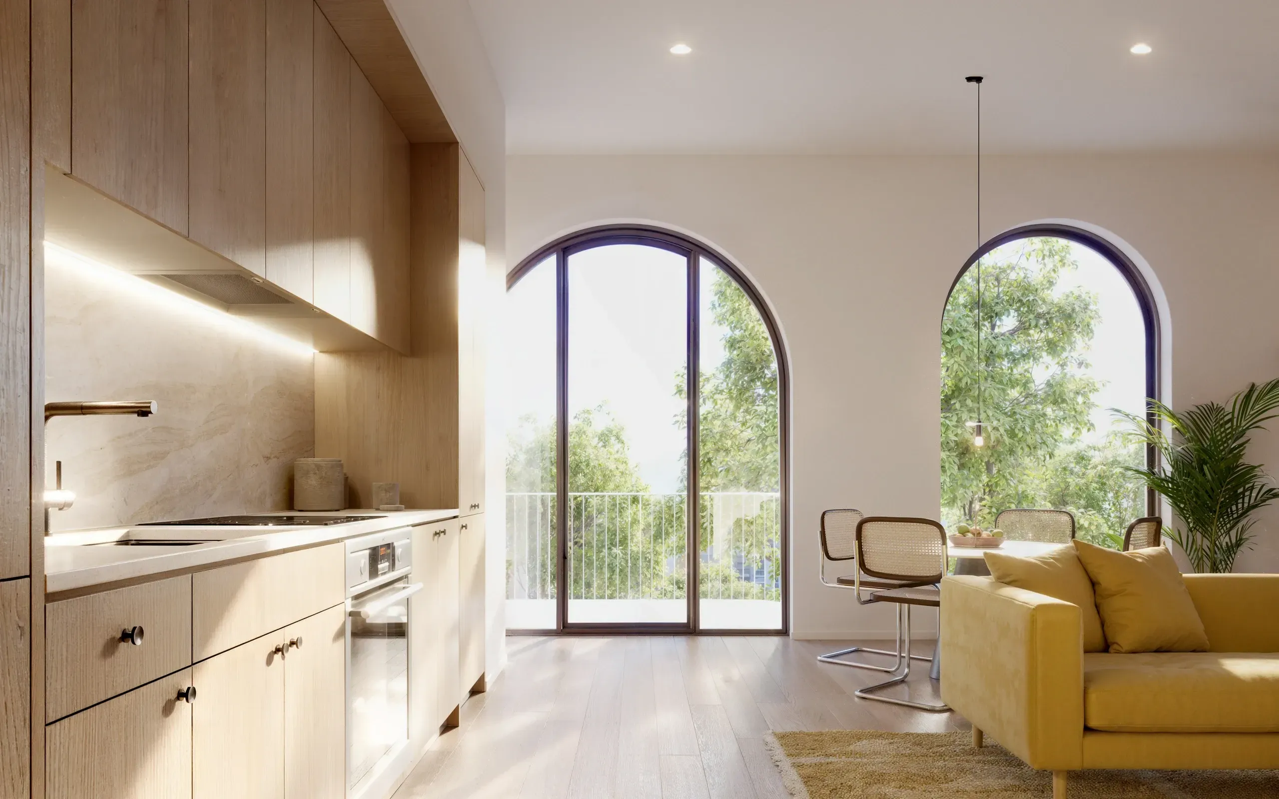 Modern apartment interior with wood kitchen, arched windows, yellow sofa, and bright natural lighting